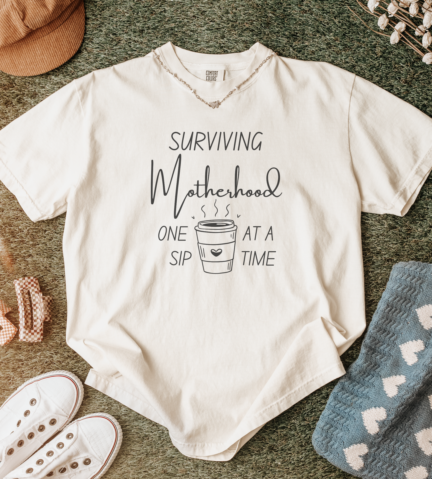 Surviving Motherhood One Sip at a Time Tee